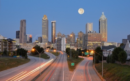 10601804-skyline-of-downtown-atlanta-georgia-from-above-freedom-parkway-with-a-full-moon.jpg